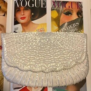 Pretty, cream beaded vintage purse.